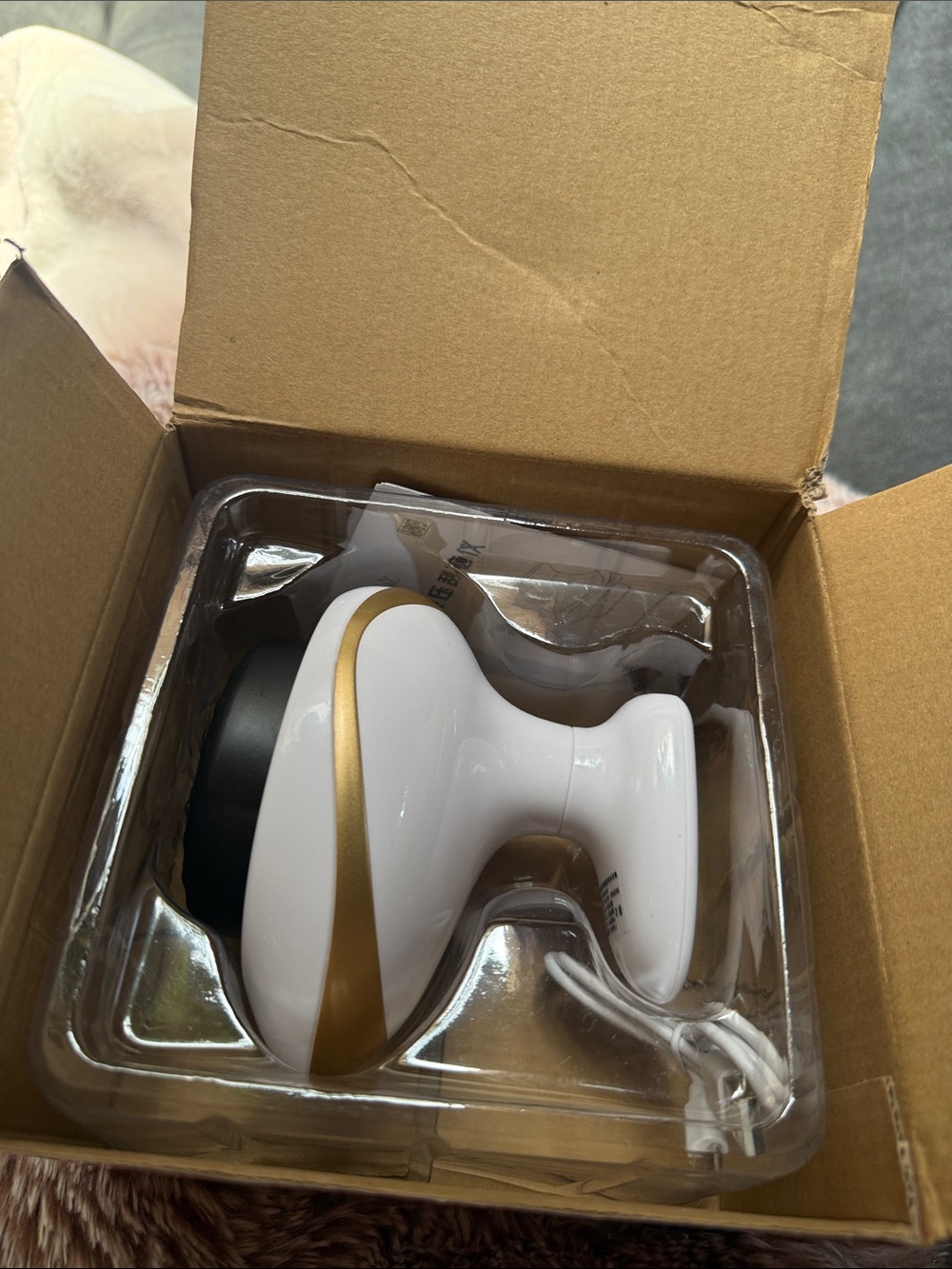 White and Gold Handheld Massager